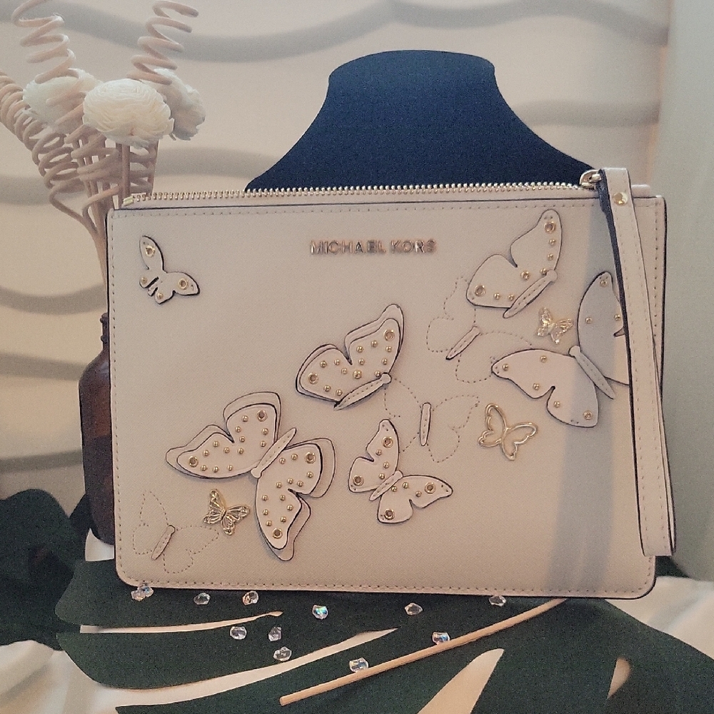 STUNNING,Michael Kors White Butterfly Clutch.never carried.